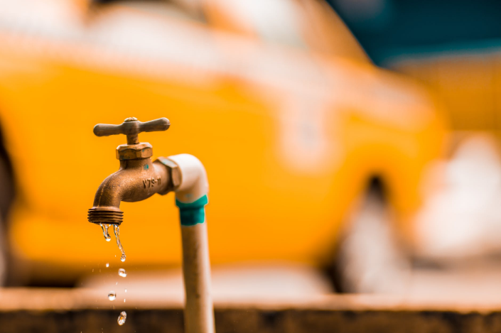 metal pipe with dripping water
